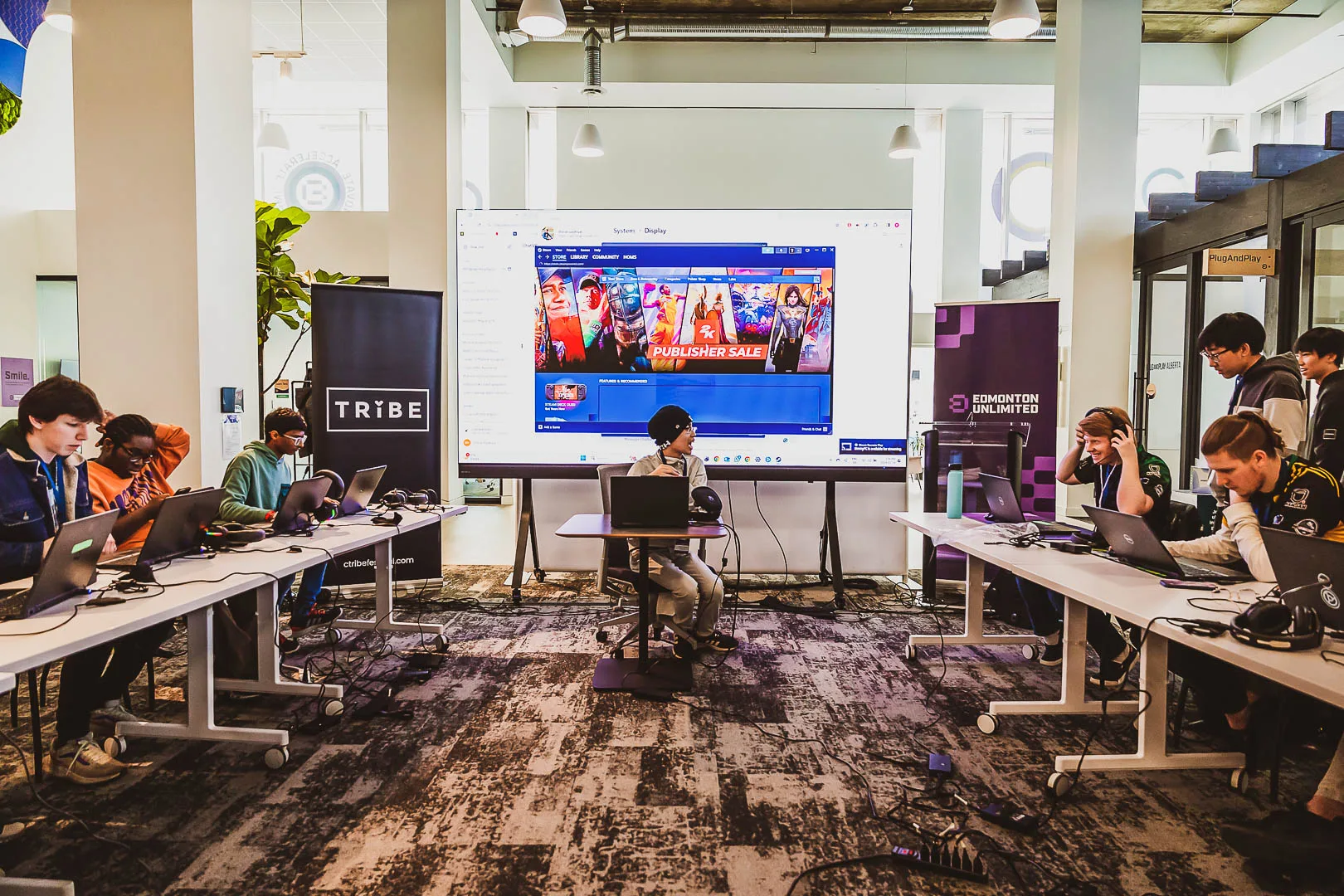 Young players competing at C-Tribe x Gaming